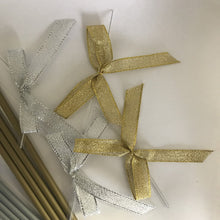 Load image into Gallery viewer, Gold and Silver Cake Pop Sticks, with silver and gold Ribbon Bows", along with 3" x 5" Clear Plastic bags - Qty 50/pack